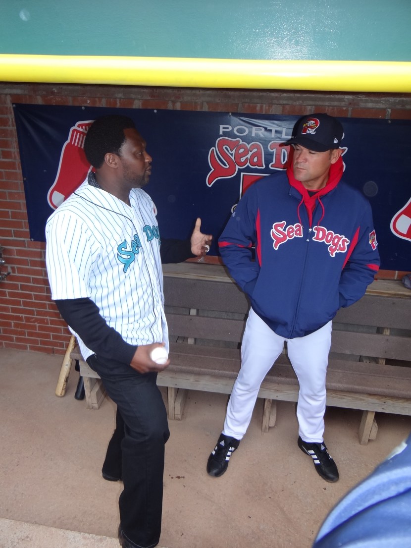 Charles Johnson, chatting, anxious to go through previously shown high five tunnel.